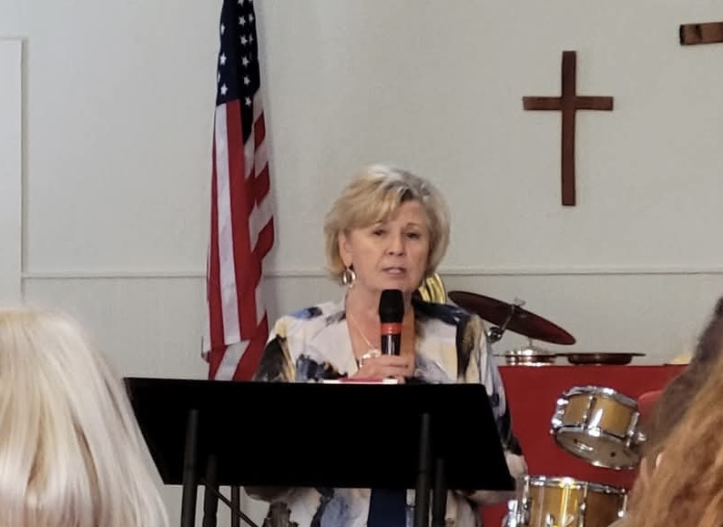 Lana Bach speaking at a church women’s event